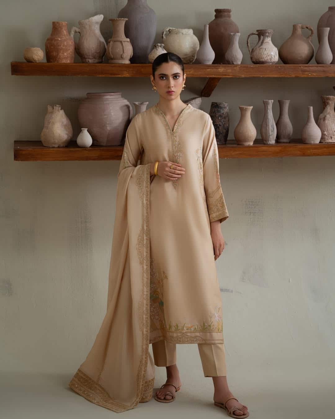 Crafted from cotton silk, the brunette beige loose fit silhouette paired with matching trousers (8) PAKISTANI BRUNETTE BEIGE DRESS. - Image 1